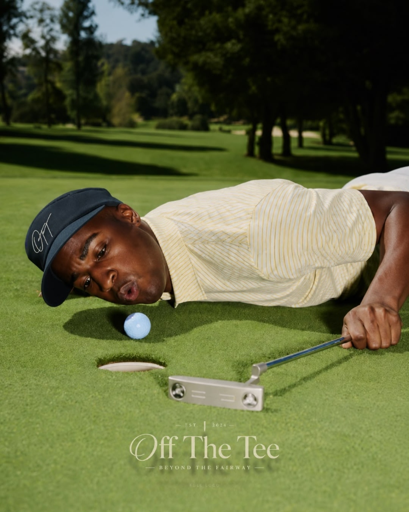 Off The Tee golfer putting on the green close up